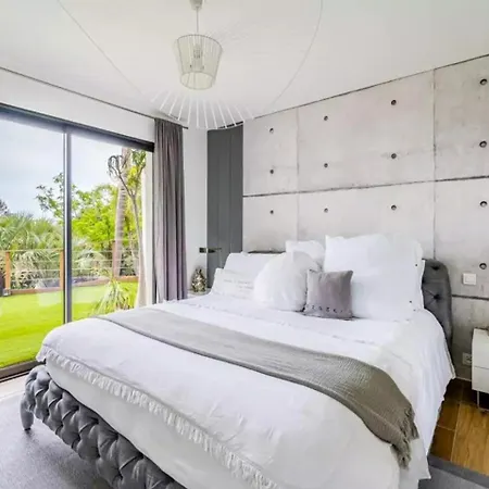 Contemporary With Hillside Views